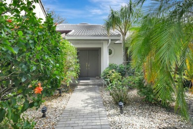 This charming villa in the Essex community offers serene water on Hunters Run Golf and Country Club in Florida - for sale on GolfHomes.com, golf home, golf lot