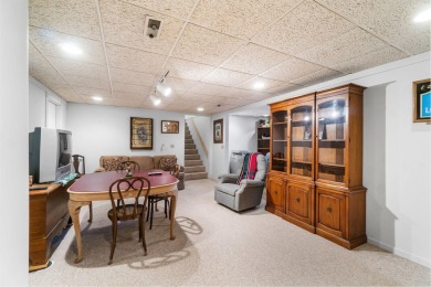 Enjoy sweeping golf course views and your own personal cart path on Gaylord Country Club in Michigan - for sale on GolfHomes.com, golf home, golf lot
