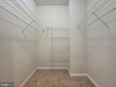 Sky-high living in this top floor condo with 2 spacious bedrooms on Leisure World Golf Club in Maryland - for sale on GolfHomes.com, golf home, golf lot