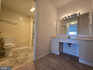 Sky-high living in this top floor condo with 2 spacious bedrooms on Leisure World Golf Club in Maryland - for sale on GolfHomes.com, golf home, golf lot