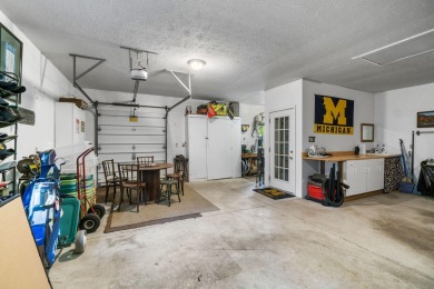 Enjoy sweeping golf course views and your own personal cart path on Gaylord Country Club in Michigan - for sale on GolfHomes.com, golf home, golf lot