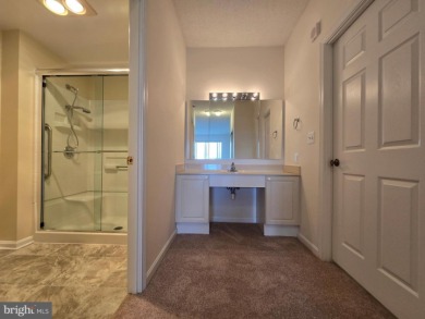 Sky-high living in this top floor condo with 2 spacious bedrooms on Leisure World Golf Club in Maryland - for sale on GolfHomes.com, golf home, golf lot