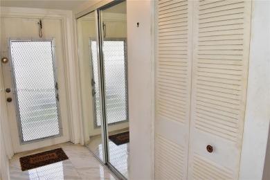 Nice first floor condo with a water view is perfect for those on Sunrise Lakes Phase III in Florida - for sale on GolfHomes.com, golf home, golf lot