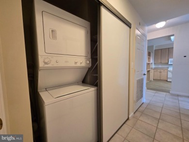 Sky-high living in this top floor condo with 2 spacious bedrooms on Leisure World Golf Club in Maryland - for sale on GolfHomes.com, golf home, golf lot