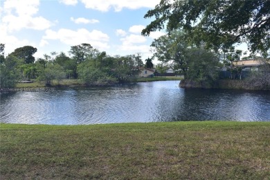 Nice first floor condo with a water view is perfect for those on Sunrise Lakes Phase III in Florida - for sale on GolfHomes.com, golf home, golf lot