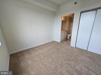 Sky-high living in this top floor condo with 2 spacious bedrooms on Leisure World Golf Club in Maryland - for sale on GolfHomes.com, golf home, golf lot
