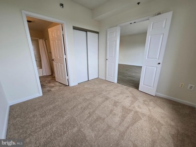 Sky-high living in this top floor condo with 2 spacious bedrooms on Leisure World Golf Club in Maryland - for sale on GolfHomes.com, golf home, golf lot