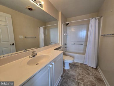 Sky-high living in this top floor condo with 2 spacious bedrooms on Leisure World Golf Club in Maryland - for sale on GolfHomes.com, golf home, golf lot