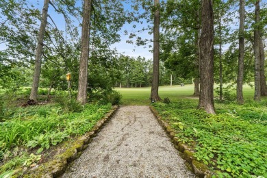 Enjoy sweeping golf course views and your own personal cart path on Gaylord Country Club in Michigan - for sale on GolfHomes.com, golf home, golf lot
