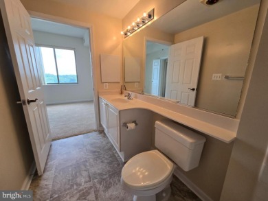 Sky-high living in this top floor condo with 2 spacious bedrooms on Leisure World Golf Club in Maryland - for sale on GolfHomes.com, golf home, golf lot