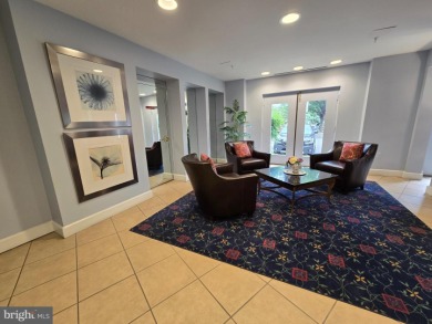 Sky-high living in this top floor condo with 2 spacious bedrooms on Leisure World Golf Club in Maryland - for sale on GolfHomes.com, golf home, golf lot