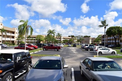 Nice first floor condo with a water view is perfect for those on Sunrise Lakes Phase III in Florida - for sale on GolfHomes.com, golf home, golf lot