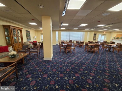 Sky-high living in this top floor condo with 2 spacious bedrooms on Leisure World Golf Club in Maryland - for sale on GolfHomes.com, golf home, golf lot