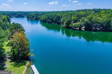 Discover lakeside living at its finest with this stunning on Fairfield Plantation Golf and Country Club in Georgia - for sale on GolfHomes.com, golf home, golf lot