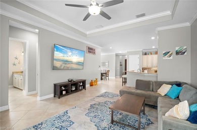 Set against tranquil lake views in highly sought-after Bonita on Bonita National Golf Course in Florida - for sale on GolfHomes.com, golf home, golf lot