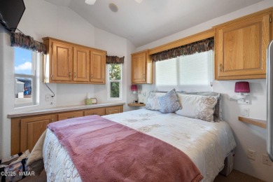 Turnkey waterfront home in sought-after Juniper Ridge Resort! on Juniper Ridge R.V. Golf Resort in Arizona - for sale on GolfHomes.com, golf home, golf lot