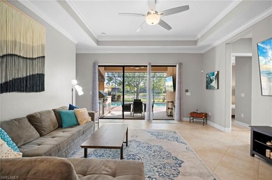 Set against tranquil lake views in highly sought-after Bonita on Bonita National Golf Course in Florida - for sale on GolfHomes.com, golf home, golf lot