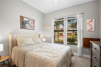 Set against tranquil lake views in highly sought-after Bonita on Bonita National Golf Course in Florida - for sale on GolfHomes.com, golf home, golf lot