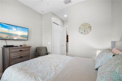 Set against tranquil lake views in highly sought-after Bonita on Bonita National Golf Course in Florida - for sale on GolfHomes.com, golf home, golf lot