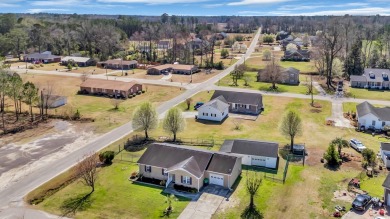 Step into the comfort and convenience of this charming on Woodland Valley Country Club in South Carolina - for sale on GolfHomes.com, golf home, golf lot