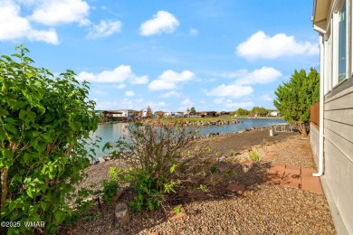 Turnkey waterfront home in sought-after Juniper Ridge Resort! on Juniper Ridge R.V. Golf Resort in Arizona - for sale on GolfHomes.com, golf home, golf lot