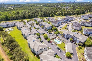 GORGEOUS TOP FLOOR THREE BEDROOM CORNER CONDO OVERLOOKING THE on Myrtlewood Golf Course and Club  in South Carolina - for sale on GolfHomes.com, golf home, golf lot