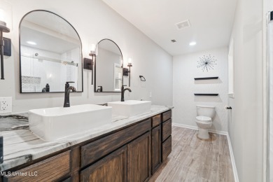 Carefully and beautifully remodeled home with nice location and on The Bridges Golf Club At Hollywood Casino in Mississippi - for sale on GolfHomes.com, golf home, golf lot