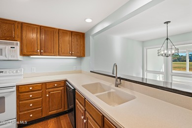 Charming Two-Story Townhome in Olde Point Villas This on Olde Point Golf and Country Club in North Carolina - for sale on GolfHomes.com, golf home, golf lot