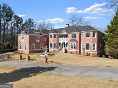 This stunning home is located in the prestigious gated section on The Golf Club of Georgia in Georgia - for sale on GolfHomes.com, golf home, golf lot