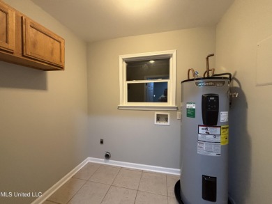 Carefully and beautifully remodeled home with nice location and on The Bridges Golf Club At Hollywood Casino in Mississippi - for sale on GolfHomes.com, golf home, golf lot