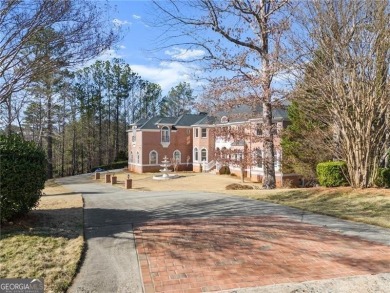This stunning home is located in the prestigious gated section on The Golf Club of Georgia in Georgia - for sale on GolfHomes.com, golf home, golf lot