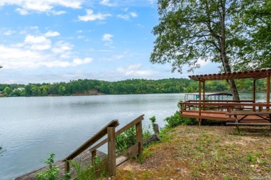 Escape to your own private paradise nestled on the serene shores on Diamondhead Golf and Country Club in Arkansas - for sale on GolfHomes.com, golf home, golf lot