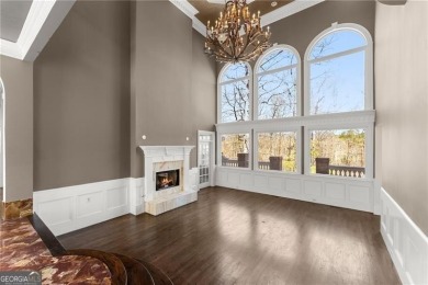 This stunning home is located in the prestigious gated section on The Golf Club of Georgia in Georgia - for sale on GolfHomes.com, golf home, golf lot