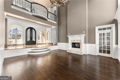 This stunning home is located in the prestigious gated section on The Golf Club of Georgia in Georgia - for sale on GolfHomes.com, golf home, golf lot