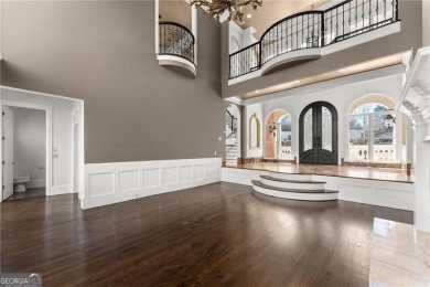 This stunning home is located in the prestigious gated section on The Golf Club of Georgia in Georgia - for sale on GolfHomes.com, golf home, golf lot