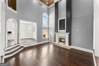This stunning home is located in the prestigious gated section on The Golf Club of Georgia in Georgia - for sale on GolfHomes.com, golf home, golf lot
