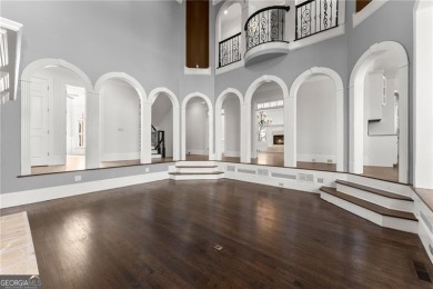 This stunning home is located in the prestigious gated section on The Golf Club of Georgia in Georgia - for sale on GolfHomes.com, golf home, golf lot