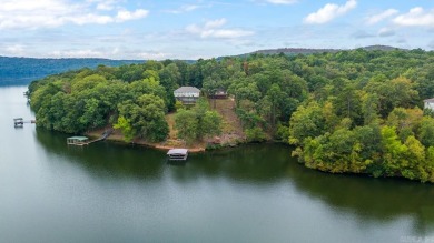 Escape to your own private paradise nestled on the serene shores on Diamondhead Golf and Country Club in Arkansas - for sale on GolfHomes.com, golf home, golf lot