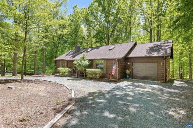 Nestled at the end of a peaceful wooded cul-de-sac in Lake on Lake Monticello Golf Course in Virginia - for sale on GolfHomes.com, golf home, golf lot