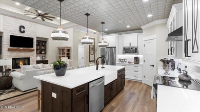 Welcome to 140 Utsesti Way! Discover contemporary elegance and on Toqua Golf Course - Loudon County in Tennessee - for sale on GolfHomes.com, golf home, golf lot