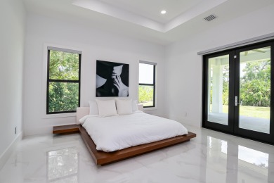 Meet elegance and sophistication with this, one of a kind, brand on St. Lucie Trail Golf Club in Florida - for sale on GolfHomes.com, golf home, golf lot