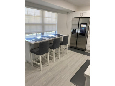 Spacious 3BR/2BA condo with 1,620 sq ft of bright, airy living on Oaks Country Club in Florida - for sale on GolfHomes.com, golf home, golf lot