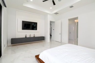 Meet elegance and sophistication with this, one of a kind, brand on St. Lucie Trail Golf Club in Florida - for sale on GolfHomes.com, golf home, golf lot