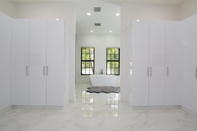 Meet elegance and sophistication with this, one of a kind, brand on St. Lucie Trail Golf Club in Florida - for sale on GolfHomes.com, golf home, golf lot