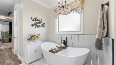 Welcome to 140 Utsesti Way! Discover contemporary elegance and on Toqua Golf Course - Loudon County in Tennessee - for sale on GolfHomes.com, golf home, golf lot