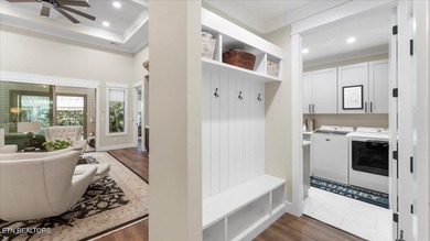 Welcome to 140 Utsesti Way! Discover contemporary elegance and on Toqua Golf Course - Loudon County in Tennessee - for sale on GolfHomes.com, golf home, golf lot