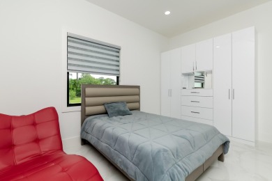 Meet elegance and sophistication with this, one of a kind, brand on St. Lucie Trail Golf Club in Florida - for sale on GolfHomes.com, golf home, golf lot