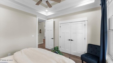 Welcome to 140 Utsesti Way! Discover contemporary elegance and on Toqua Golf Course - Loudon County in Tennessee - for sale on GolfHomes.com, golf home, golf lot