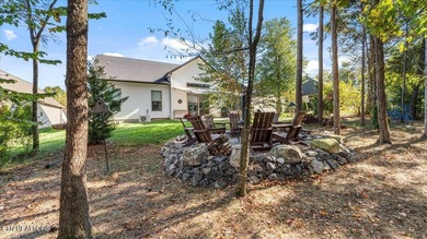 Welcome to 140 Utsesti Way! Discover contemporary elegance and on Toqua Golf Course - Loudon County in Tennessee - for sale on GolfHomes.com, golf home, golf lot