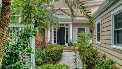 This stunning 3 bedroom, 3.5 bath home, designed by the renowned on The Oaks Club in Florida - for sale on GolfHomes.com, golf home, golf lot